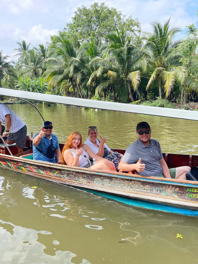 1-Day Trip: Floating Market & Railway Market by Toyota Camry - Coconut sugar, canal views, and market food