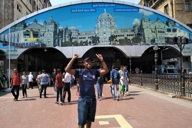 All in one-Combo of City, Dhobighat, Slum & Dabbawala with ferry and train ride. - Gateway of India and a ferry from Colaba
