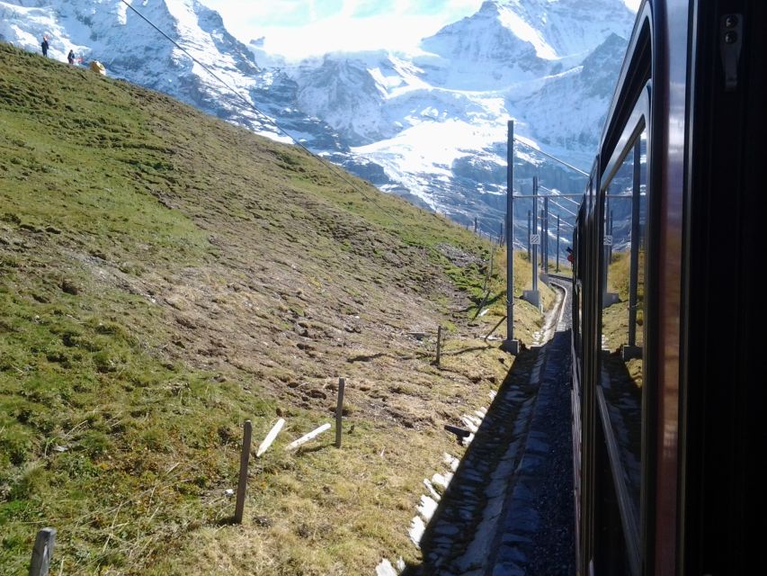 Alpine Majesty: Bern to Jungfraujoch Exclusive Private Tour - The Sphinx Observatory and the outdoor viewing deck