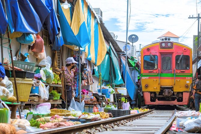 Amphawa Floating Market & Maeklong Railway Train Market Tour - Amphawa is a canal-side food market