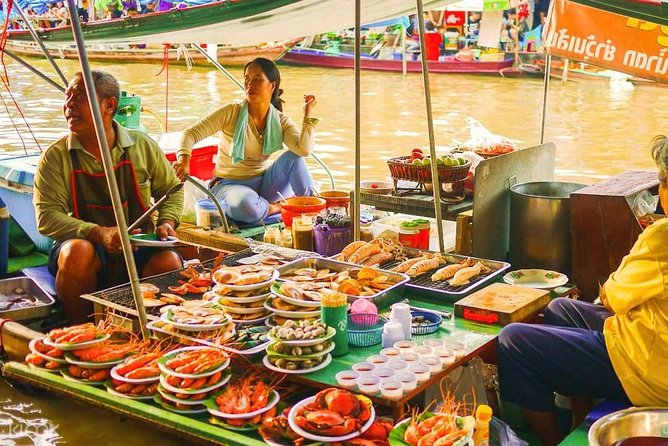 Amphawa Floating Market Tour with Maeklong Railway Market (SHA Plus) - The train moment at Maeklong Railway Market