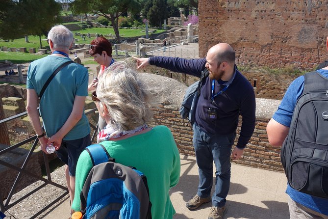 Ancient Ostia Antica Semi-Private Day Trip from Rome by Train with Guide - Forum buildings, temples, shops, and homes