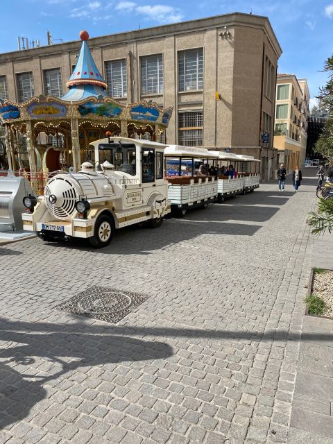 Antibes: 2-Way Little Train of Antibes Tour to Juan-les-Pins - How the two-way ticket works for your day
