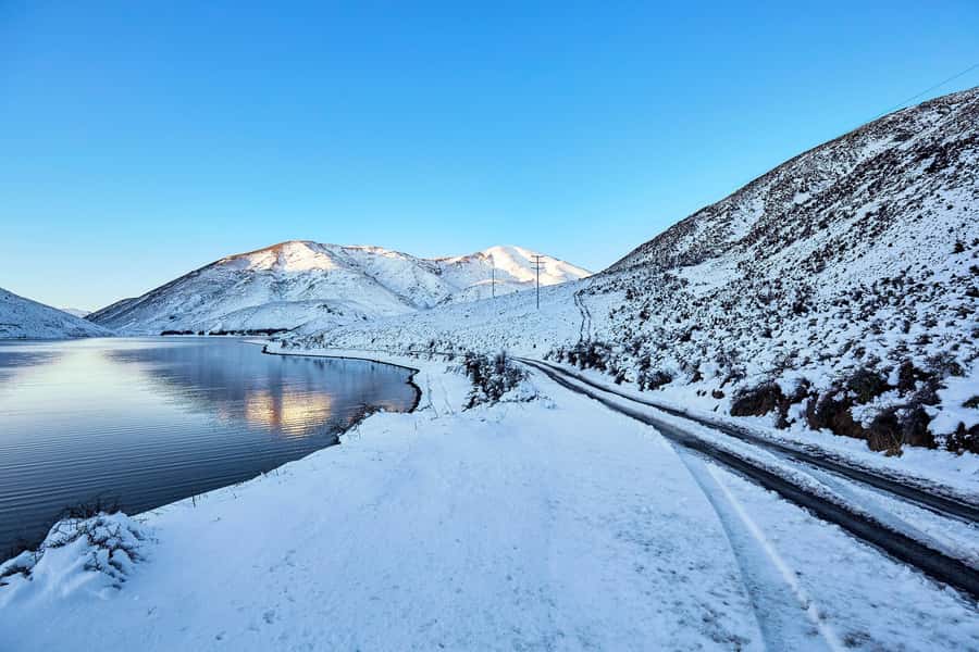 Arthur's Pass: TranzAlpine Train and Castle Hill Day Tour - Lake Pearson offers a quieter photo stop