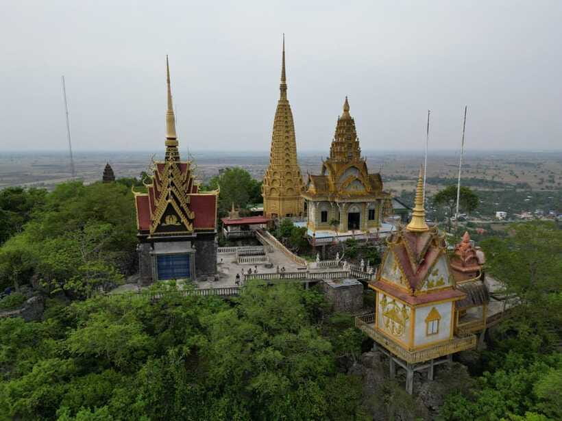 Bamboo train. Phnom Sampove cave. Bat cave and Banan Temple - Banan Temple brings the ancient sites into focus