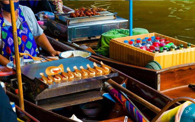Bangkok: Damnoen Saduak and Train Market with Boat Ride - A long-tail boat through Damnoen Saduak