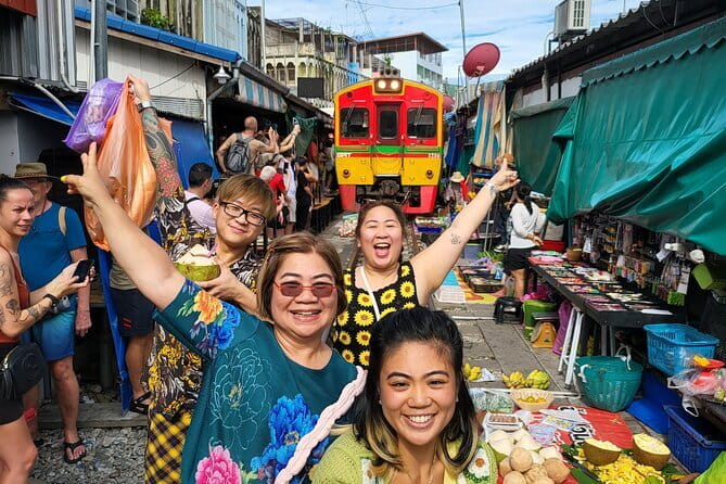Bangkok: Floating Market & Train Market Discovery - Watching Maeklong Market fold around the train