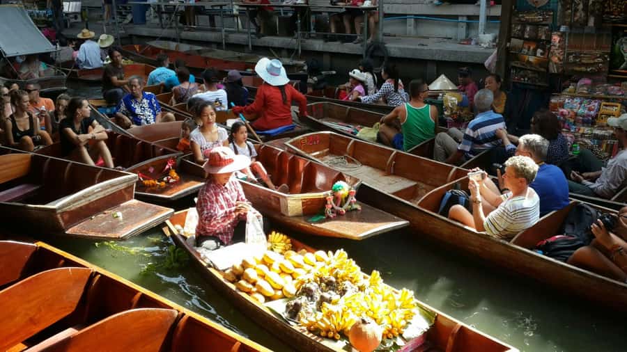 Bangkok: Maeklong Railway & Damnoen Saduak Floating Markets - A short lesson in coconut sugar at the village stop