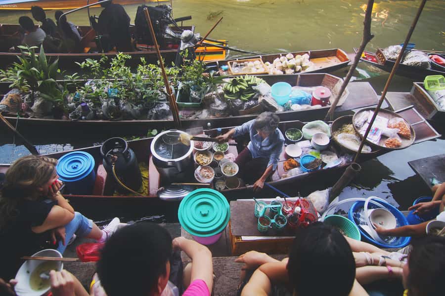 Bangkok: Maeklong Train Market & Floating Market Day Tour - Maeklong Railway Market and the train passage