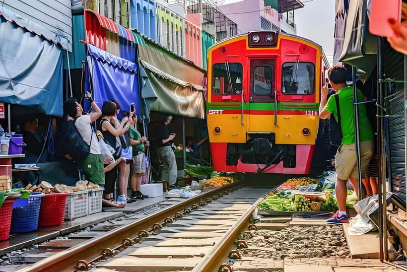 Bangkok: Railway, Floating Market & Chao Phraya Cruise Tour - Maeklong Railway Market and the train that cuts through it