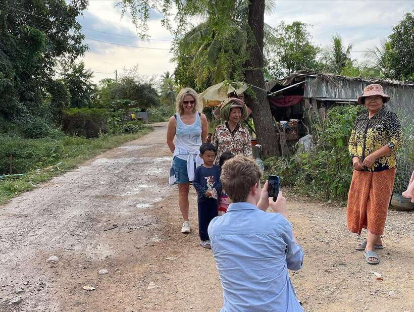 Battambang: Bamboo Train, Bat Cave and Killing Cave Tour - Along the river, through villages and across a suspension bridge