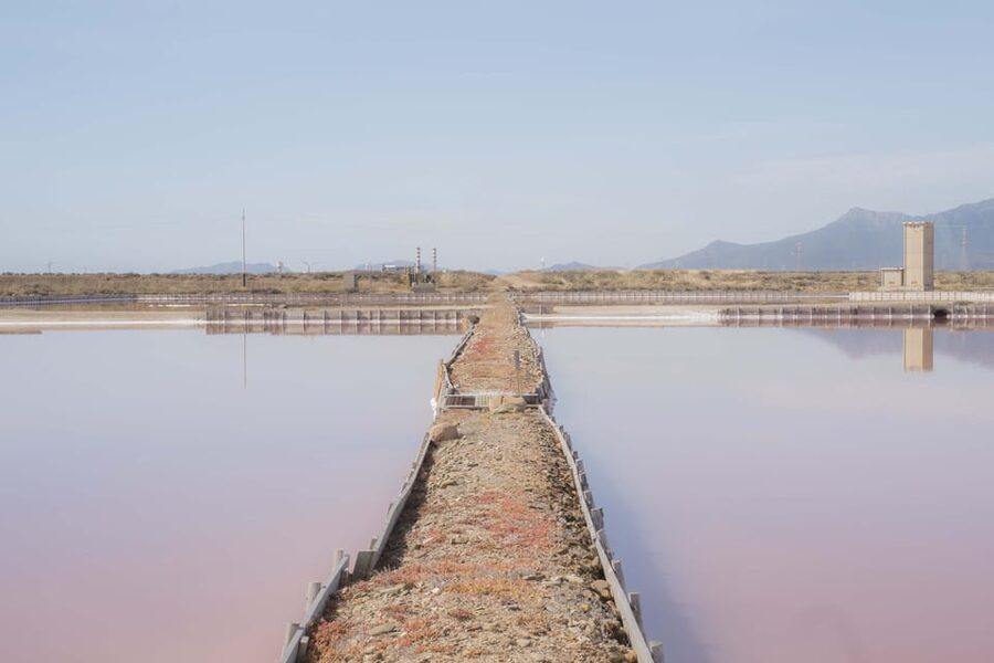 Cagliari: Conti Vecchi Salt Flats Train and Tour - Macchiareddu adds a human side to the industrial site