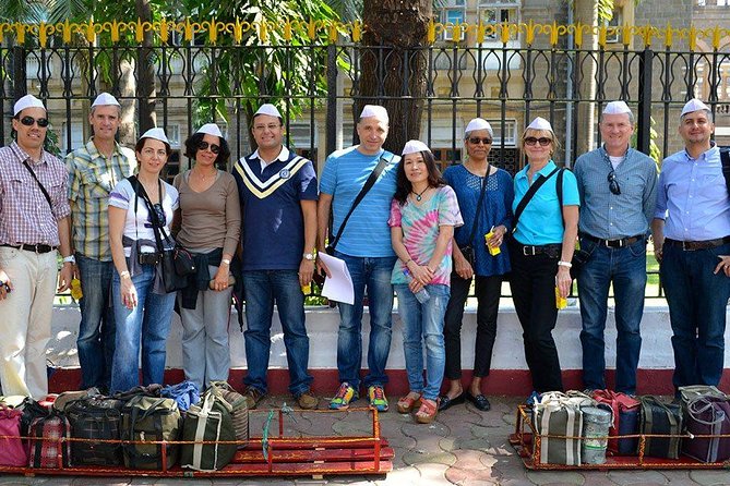 Dabbawala, Dhobi Ghat & Dharavi slum Tour with Local Train Ride - Meeting the dabbawalas and understanding the lunch network