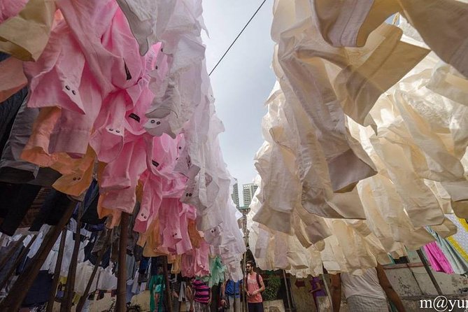 Dabbawala, Dhobi Ghat & Dharavi slum Tour with Local Train Ride - Mahalaxmi Dhobi Ghat and Mumbai’s outdoor laundry