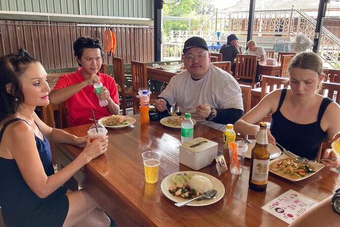 Damnoen Saduak and Maeklong Railway Market Tour with Private Car - Paddle boats at Damnoen Saduak Floating Market