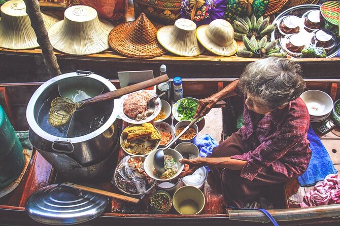 Damnoen Saduak Floating Market & Maeklong Railway Market Tour From Bangkok - What the guide adds to the day