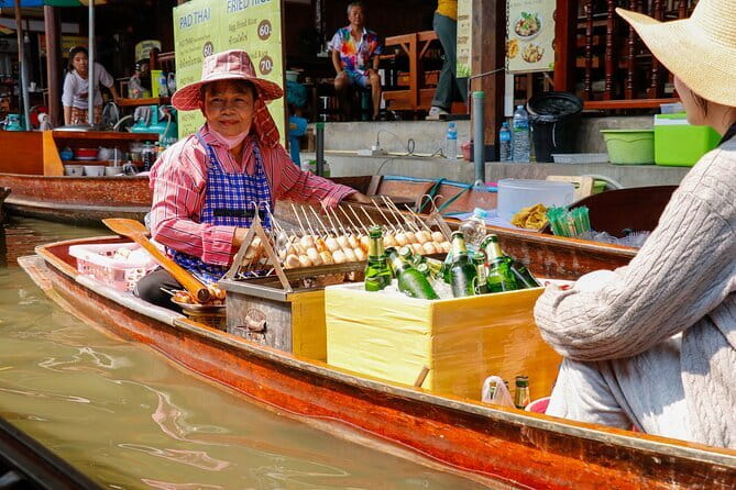 Day Trip to Bangkok Floating Market & Maeklong Railway - Damnoen Saduak by long-tail boat