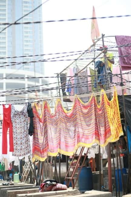 Dhobi Ghat Laundry and Dharavi Slum Tour with Local Train - Walking through Dharavi for two hours