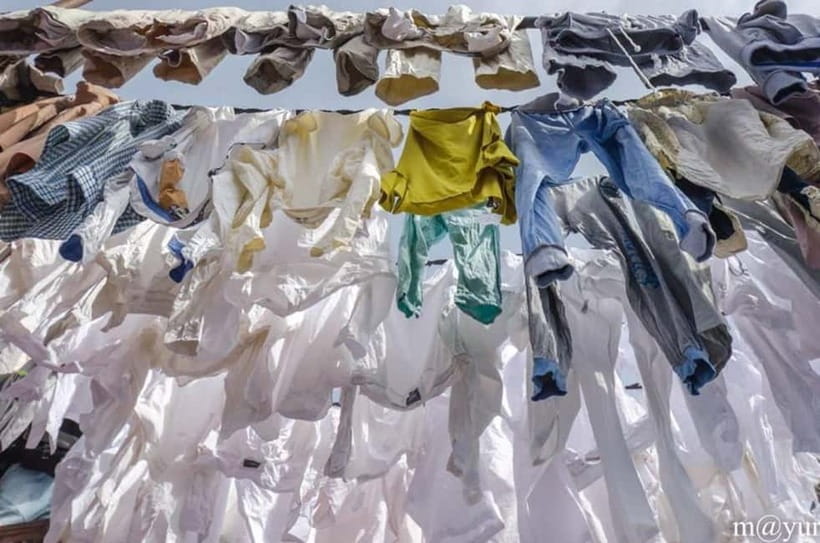 Dhobi Ghat Laundry and Dharavi Slum Tour with Local Train - Dhobi Ghat: Mumbai’s laundry system in plain sight