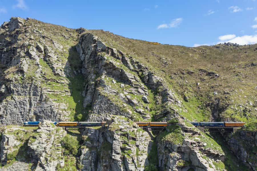 Dunedin: Scenic Railway Tour Through the Taieri Gorge - Leaving Dunedin from the city’s grand railway station