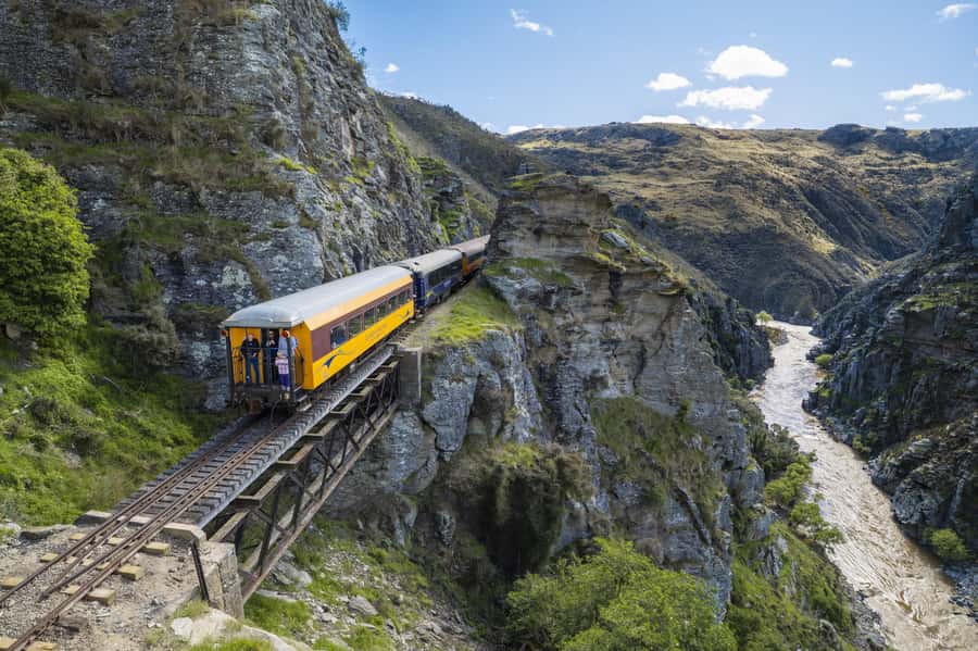 Dunedin: Scenic Railway Tour Through the Taieri Gorge - Following the Taieri River through old engineering works