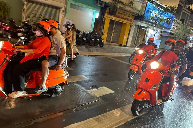Female Riders Vespa Night Street Food + Train Street food 4 Hours - Why a Vespa is a smart way to eat Hanoi at night