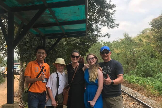 Floating and Railway Markets and Erawan Waterfall (Group Tour) - Returning to Bangkok through MBK Center