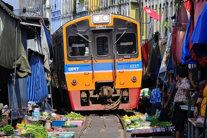 Floating Market Damnoen Saduak and Meklong Railway Market: Half Day Tour - Leaving Bangkok at 7:00 a.m.
