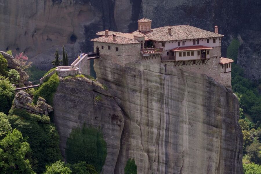 From Athens: Meteora Train Trip with Overnight Stay - Entering the monasteries: clothing, stairs, and cash