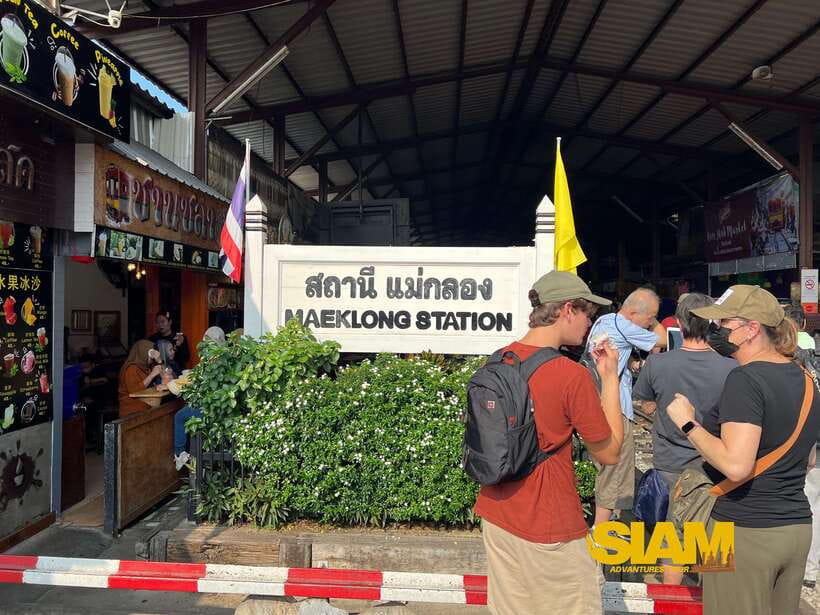 From Bangkok:Damnoen Floating Market and Railway Market Tour - Maeklong Railway Market and the passing train