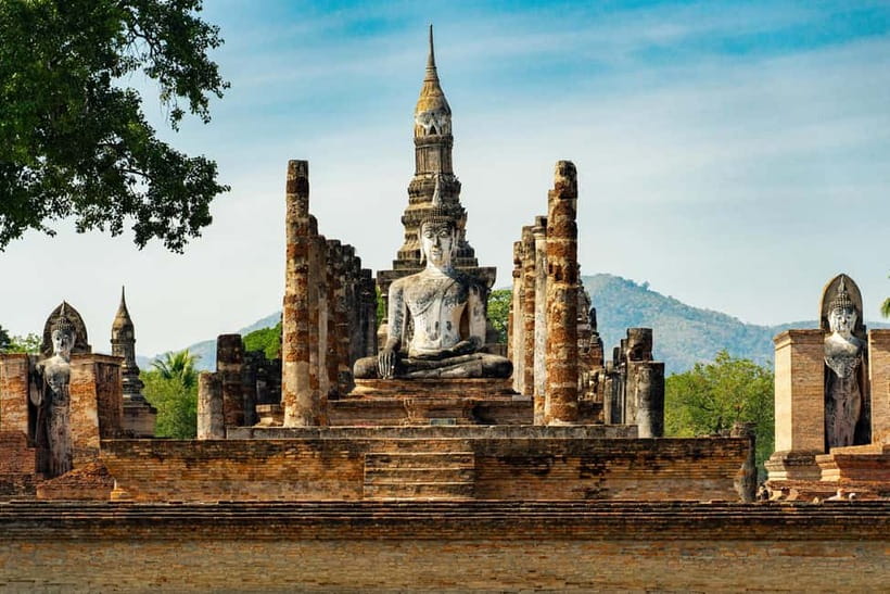 From Bangkok: Iconic Ayutthaya Tour By Rail, Road, and River - Wat Mahathat and the Buddha head in the roots