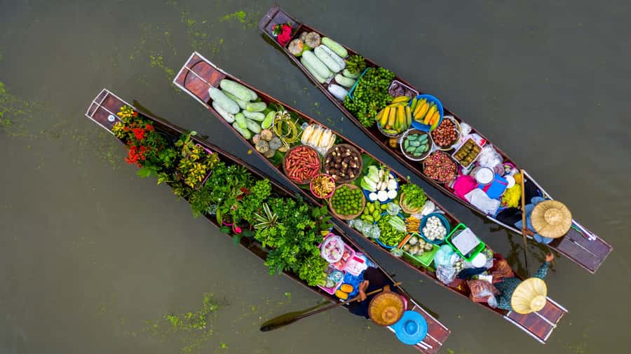 From Bangkok: Maeklong Railway and Floating Market Food Tour - Thai snacks that make the market visit worthwhile