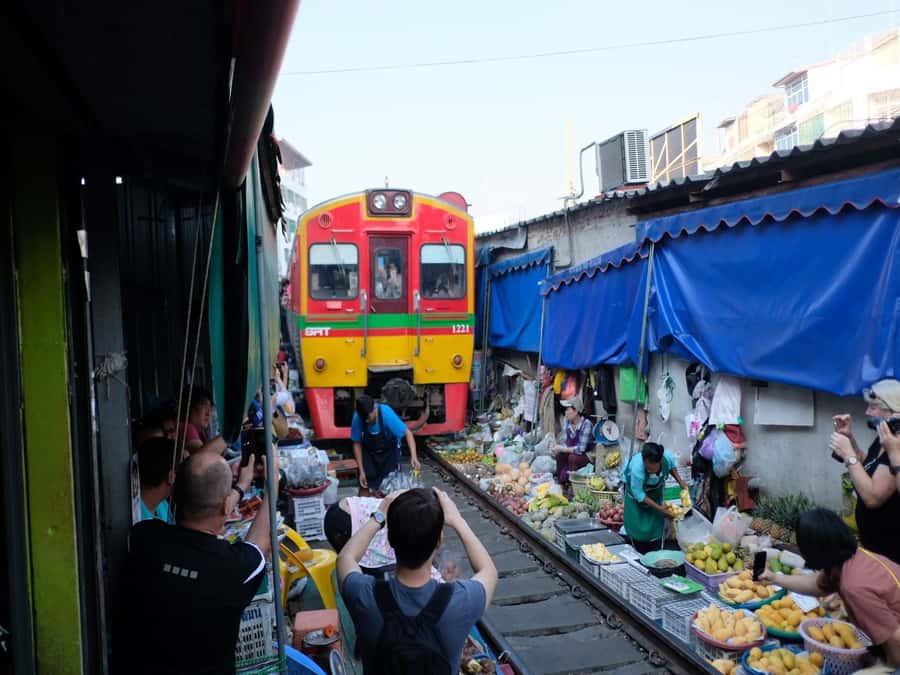 From Bangkok: Private Railway and Floating Market Tour - Cruising narrow canals toward Damnoen Saduak