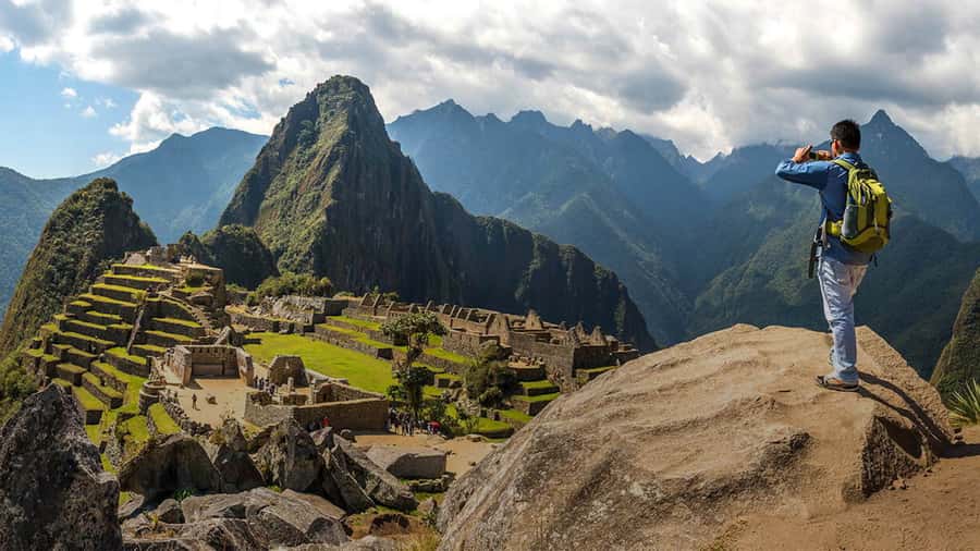 From Cusco: Train Ride and Guided Tour of Machu Picchu - Entering Machu Picchu with a private guide