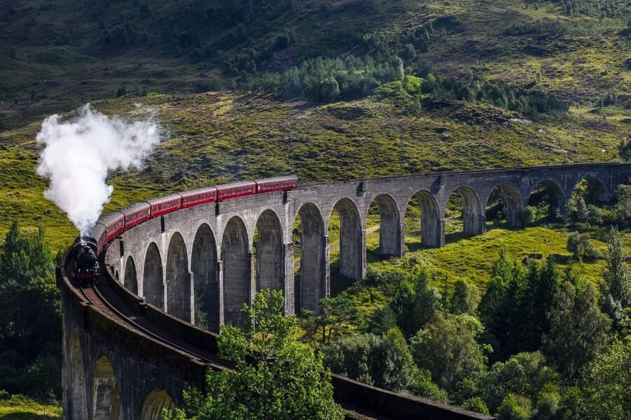From Glasgow: Jacobite Steam Train & The Highlands Tour - Leaving Glasgow through Loch Lomond