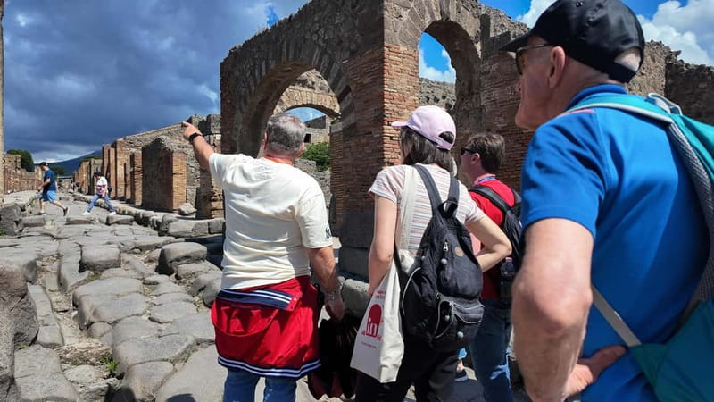 From Naples: Guided tour of Pompeii skip-the-line and round-trip train - Meeting at Napoli Centrale