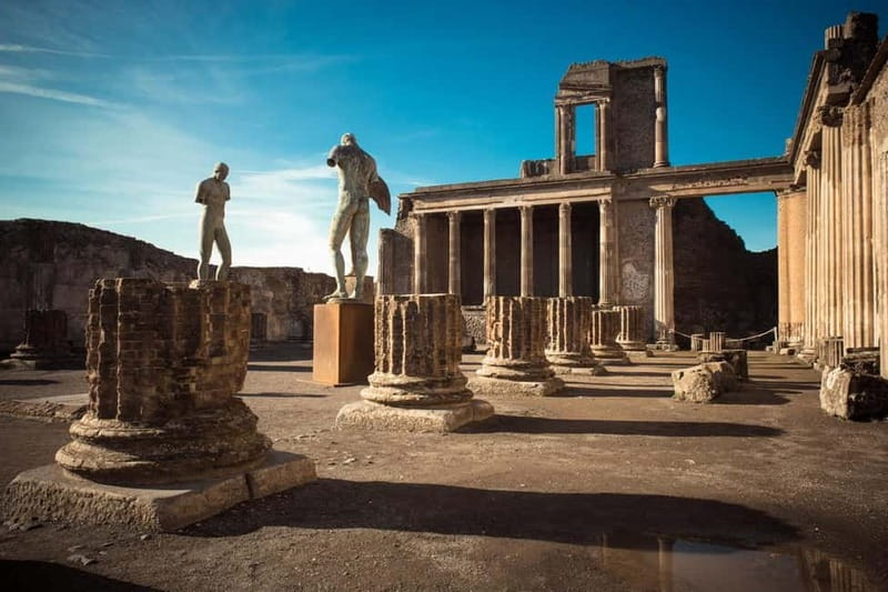 From Naples: Guided tour of Pompeii skip-the-line and round-trip train - Two Hours Among Temples, Baths, and Frescoes