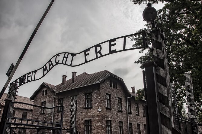 From Warsaw: Auschwitz-Birkenau Tour with Premium Train Transportation - Auschwitz I: camp buildings, exhibits, and original structures