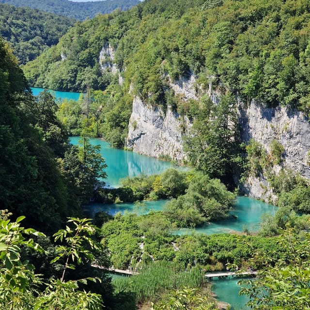From Zadar: Plitvice Lakes Guided Tour with Boat & Train - About Four Hours Among Waterfalls and Wooden Paths