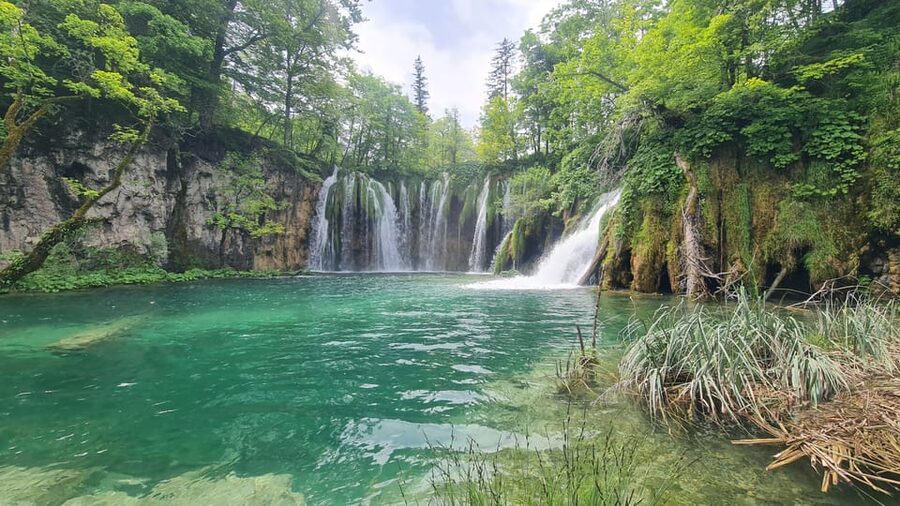 From Zadar: Plitvice Lakes Guided Tour with Boat & Train - Summer Crowds, Spring Color, and Autumn Light