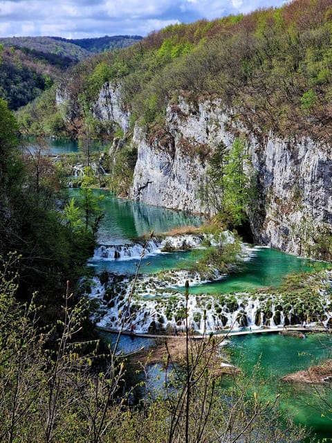 From Zadar: Plitvice Lakes Tour with Boat & Train Ride - Choosing between the 4-kilometer B route and 8-kilometer C route