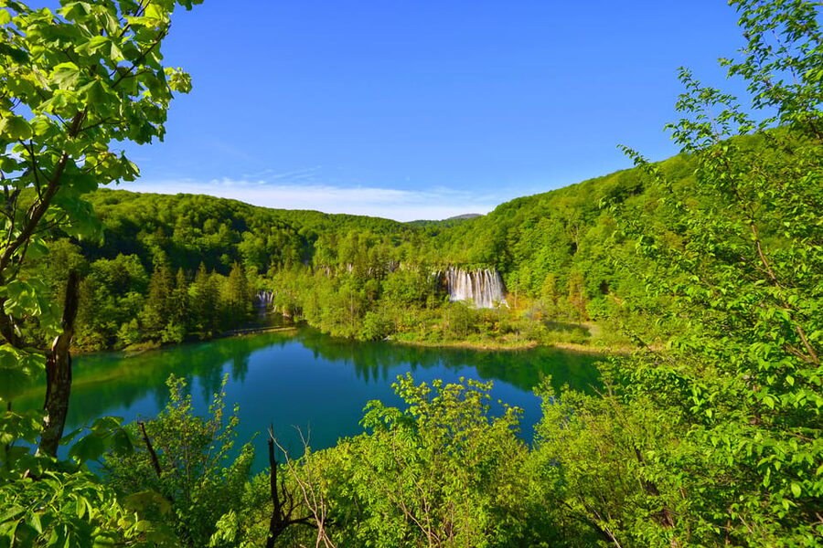 From Zadar: Plitvice Lakes Tour with Boat & Train Ride - Crowds, weather, and the real feel of the park