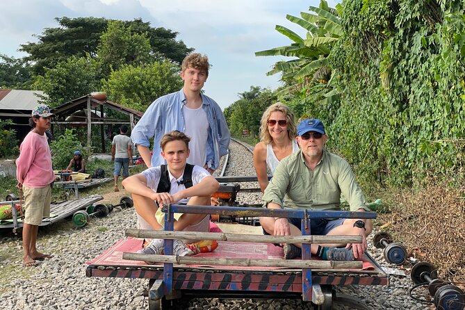 Full day tour by bicycle & tuk tuk,bamboo train,bat cave,villages - Wat Samrong Knong and Cambodia’s difficult past