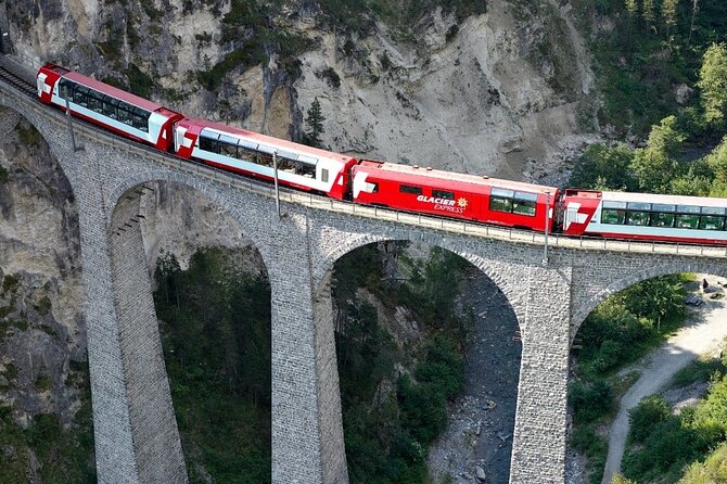 Grand Rail Tour of Switzerland - St. Moritz and the Bernina route cross a dramatic border