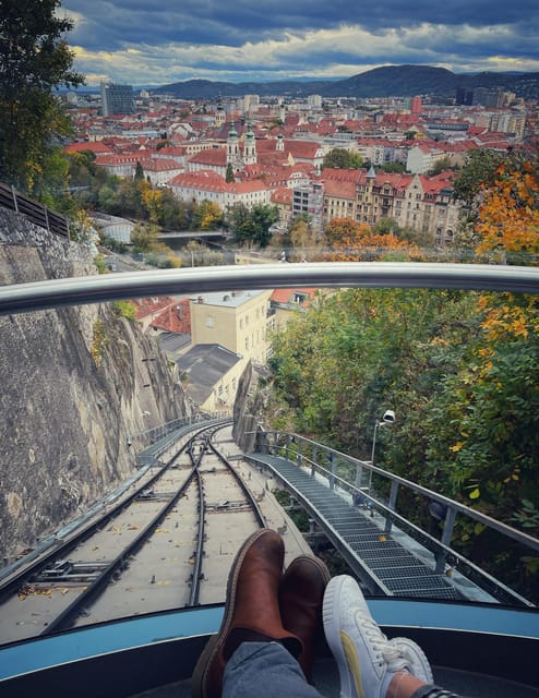 Graz: Funicular Ride & Schlossberg Picnic Experience - Walking through Schlossberg’s paths and stories