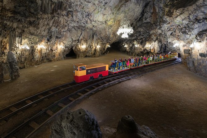 Group tour to Postojna Cave from Koper - with unique cave train - Guides, groups, and the shore-excursion rhythm