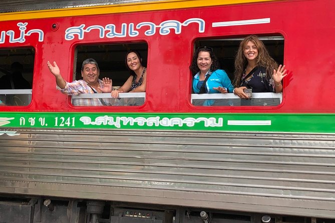 Half-Day Railway Market and Floating Market Tour in Thailand - The train that cuts through Maeklong Market