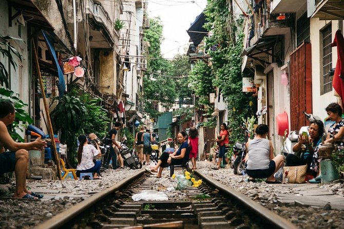 Hanoi city tour and drinking beside railway- group tour - Tran Quoc Pagoda and West Lake