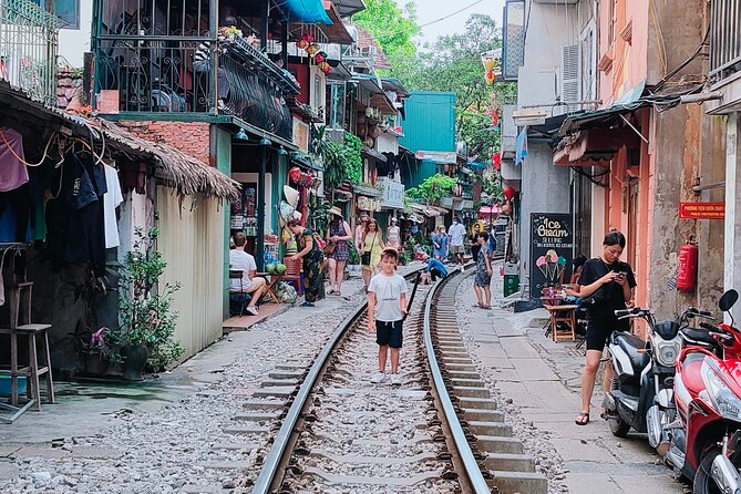 Hanoi city tour and drinking beside railway- group tour - Lunch in or near Hanoi’s Old Quarter