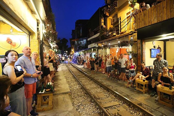 Hanoi City Walking Tour Discover Hidden Gems and Train Street - Dong Xuan Market and the working side of the Old Quarter